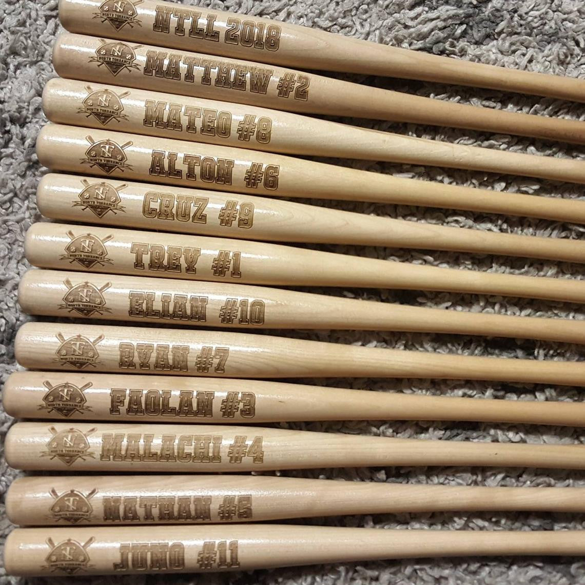 6 miniature wood baseball bats
